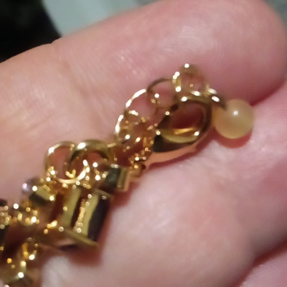 Beautiful Gold Tone Purple Stone Bracelet NVC
